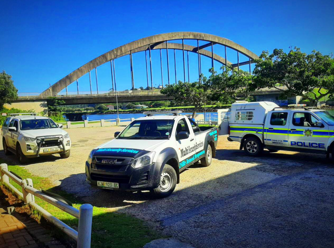 Multi Security vehicles beside the Port Alfred bridge